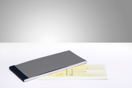 Cheque book with a blank chequeの写真素材