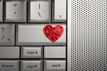 love heart on the return key for internet datingの写真素材
