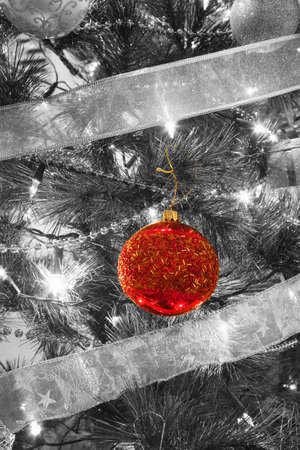 close up of Christmas Baubles on a illuminated Christmas treeの写真素材