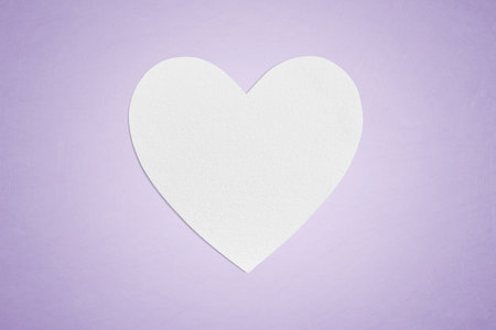 White love heart shaped blank textured paper for copy spaceの写真素材