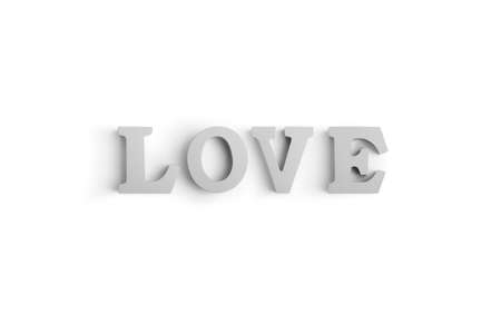 Wooden letters spelling LOVE with a heart shaped white balloonの写真素材