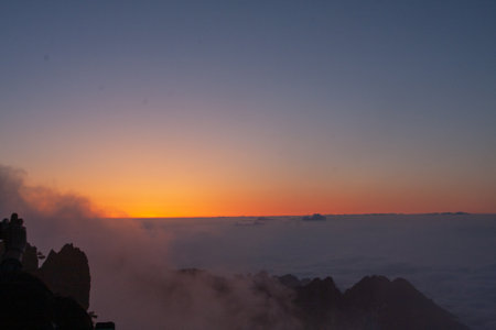 Sunrise in the morning at the top of the mountainの写真素材