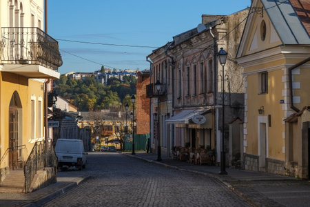 Narrow cobbled street in the old city of Kamianets-Podilski Ukraine. The city is famed for it's castle and canyon surrounding the old townのeditorial素材