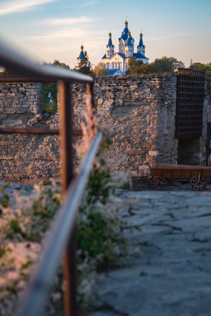 Abstract view of the church of Cerkiew  Grzegorza in Kamianets-Podilskyi Western Ukraine. A railing leads the eye to the church.のeditorial素材