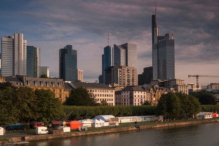 Shot of the Frankfurt skyline on a summer morning. Taken from Holbeinsteg bridge with River Mainのeditorial素材