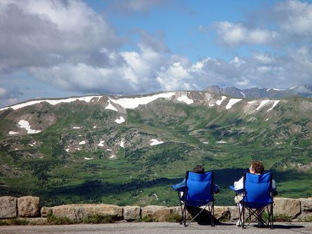 These two ladies enjoy the high alpine sun in Rocky Mountain National Park.の写真素材