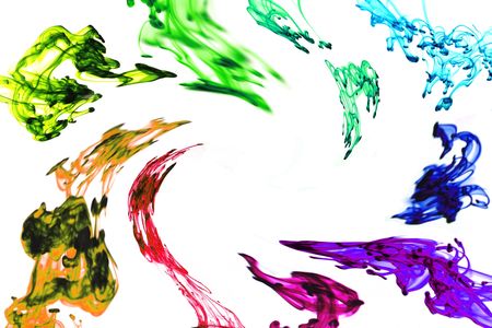 Multiple drops of colored ink swirling to form a frame as they move through water, isolated on white.の写真素材