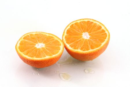 Fresh orange slices isolated on white.の写真素材