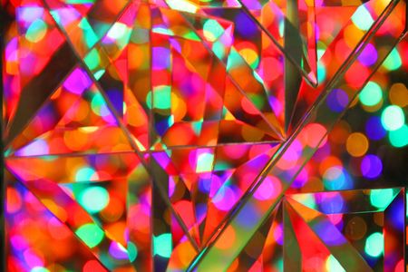 Colorful light blured behind artisitic glass.の写真素材