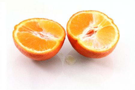 Fresh orange slices isolated on white.の写真素材