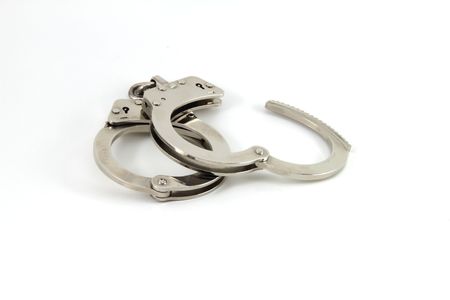 Police handcuffs isolate with copy space.の写真素材