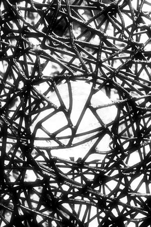 A Detail of an abstract metal wall with glass in the center.の写真素材