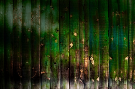Wooden planks with aged green space with copy space.の写真素材