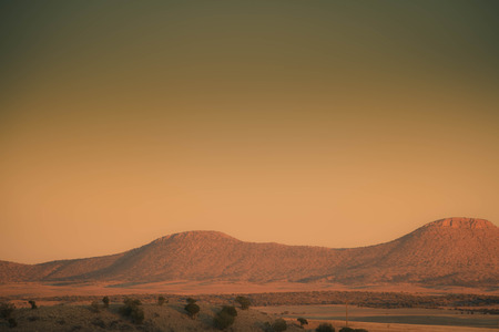 The high, open desert of Arizona with mountains in the distance.の写真素材
