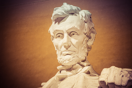 Night time image of the statue of Abraham Lincoln in the Lincoln Memorial in Washington DC.のeditorial素材