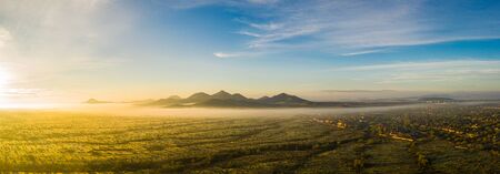 Panorama image from a drone of fog in the Sonoran Desert of Arizona during sunrise.の写真素材