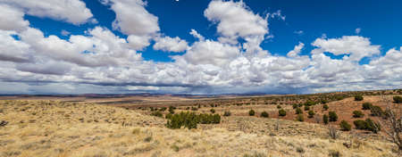 A panorama looking over the desert of northern Arizona with the Vermillion cliffs in the distance on...