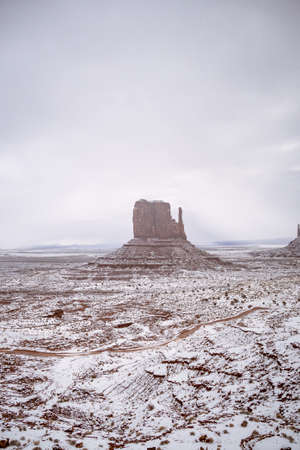 Classic southwest desert landscape with snow on the ground in Monument Valleyin Arizona and Utah.