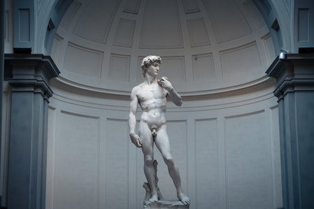 The masterpiece renaissance sculpture of David by Michelangelo lookup up at the Davidâs face.のeditorial素材