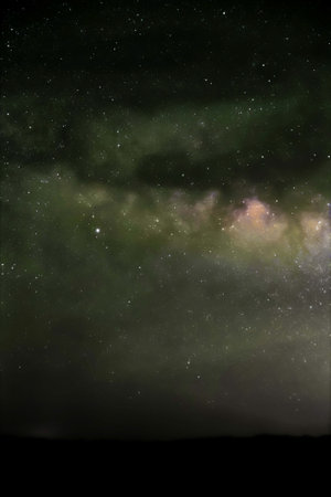 The Milky Way galaxy core in natural color in the night sky.の写真素材