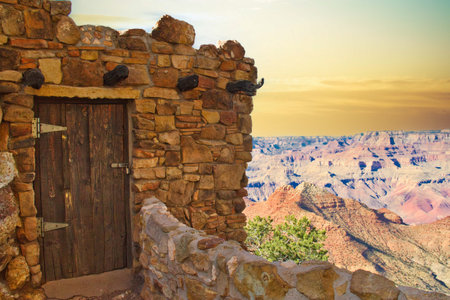 A historic southwest style building on the edge of the Grand Canyon.の写真素材