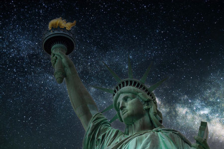 Looking up at the Statute of Liberty with a neutral background.の写真素材