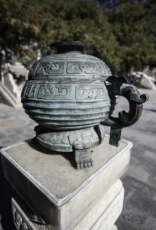 The bronze tripod (Ding) often used in the worship of heaven and earth,in summer palace of Beijing, China.の写真素材