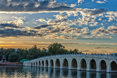 The Famous 17 arch lion bridge in Summer Palace outside of Beijing, China.の写真素材