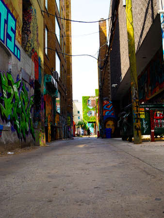 TORONTO CANADA - 2015: Grafitti Alley during the dayのeditorial素材