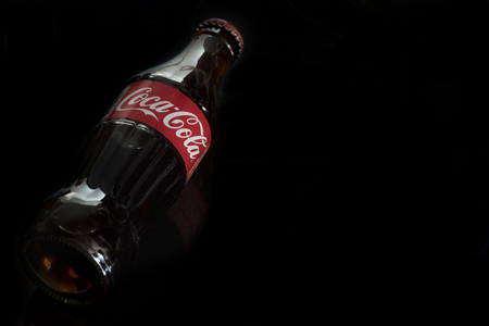 Bangkok, THAILAND February 17: Coca-Cola in a glass bottle on black Background. on 17 February 2016 in Bangkok ,Thailandのeditorial素材