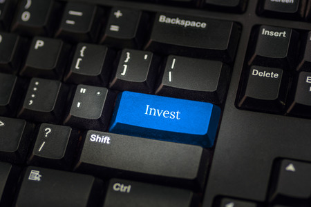 Close-up view on conceptual keyboard - Investの写真素材