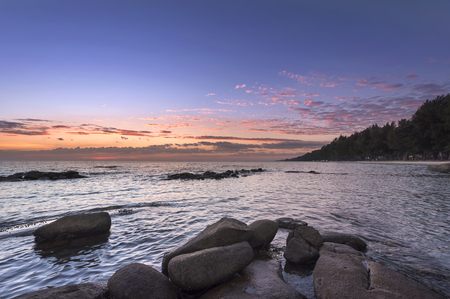Rock and seascape at sunset timeの写真素材