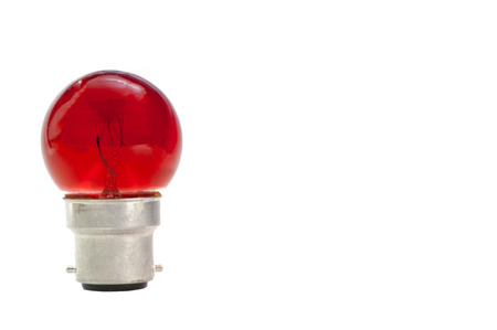 red light bulb isolated on white backgroundの写真素材