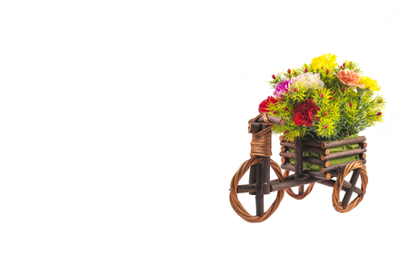 Flower on wood bicycle white backgroundの写真素材