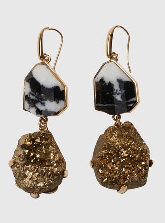 Elegant loop earrings with black marble and golden stone at bottom with white background, Elegant loop earrings with black marble and golden stone at bottom with white backgroundの写真素材