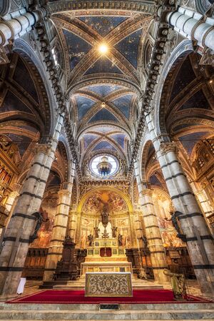 Siena, Italy - April 9, 2019: Panoramic view of interior of medieval Siena Cathedral (Duomo di...