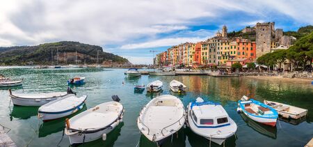 Porto Venere, Italy - April 7, 2019: Colorful picturesque harbour of Portovenere with San Lorenzo church and Doria Castle in Liguria, Italy.のeditorial素材