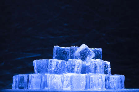 Ice cubes pile with cold abstract backgroundの写真素材