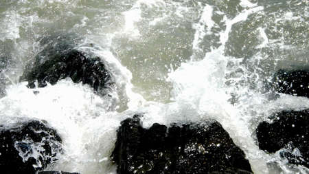 Waves crashing against the rocks