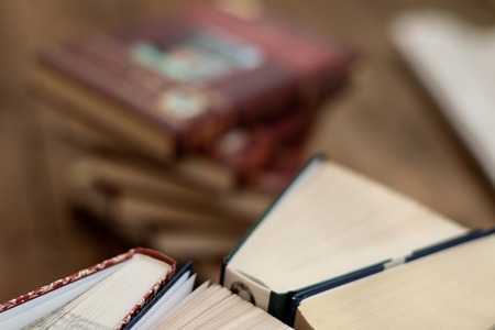 Stack of varied books many books piles Education learning concept
