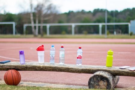 Drinking water concept, water bottles on basketball court healthy life concept