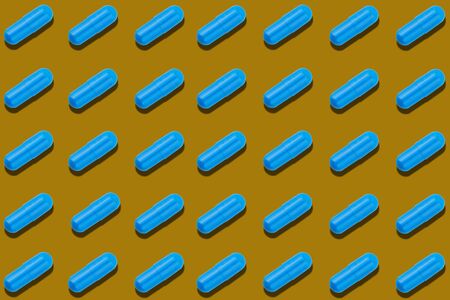 Seamless pattern with blue pills on brown background. Medicine health pharmacy pharmacology concept.の写真素材