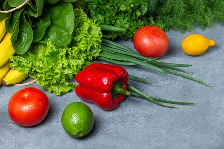Assorted raw vegetables and fruits background.Healthy clean eating, dieting conceptの写真素材