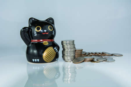 Lucky black cat piggy bankの写真素材