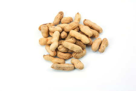 dry peanuts isolated on white