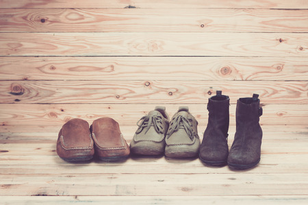 Leather shoes on wooden backgroundの写真素材