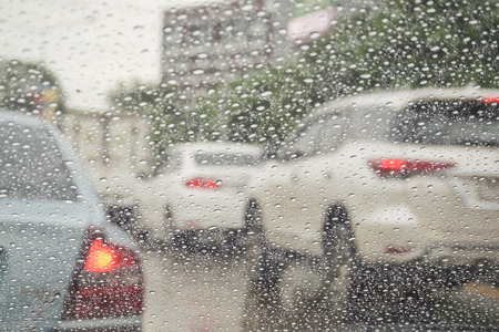Drive in a rainy day, Rain drops on windshield car
