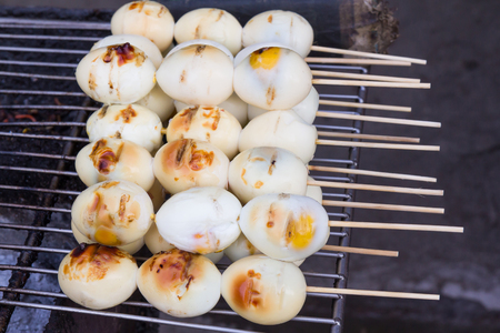 Thai street food, Grilled chicken eggs.の写真素材