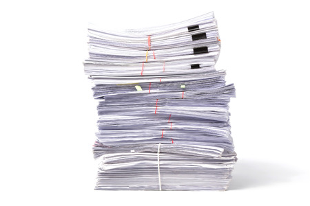 Stack of business papers isolated on white background