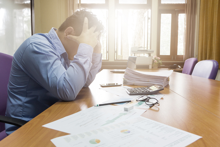 Business man working with paperworkの写真素材